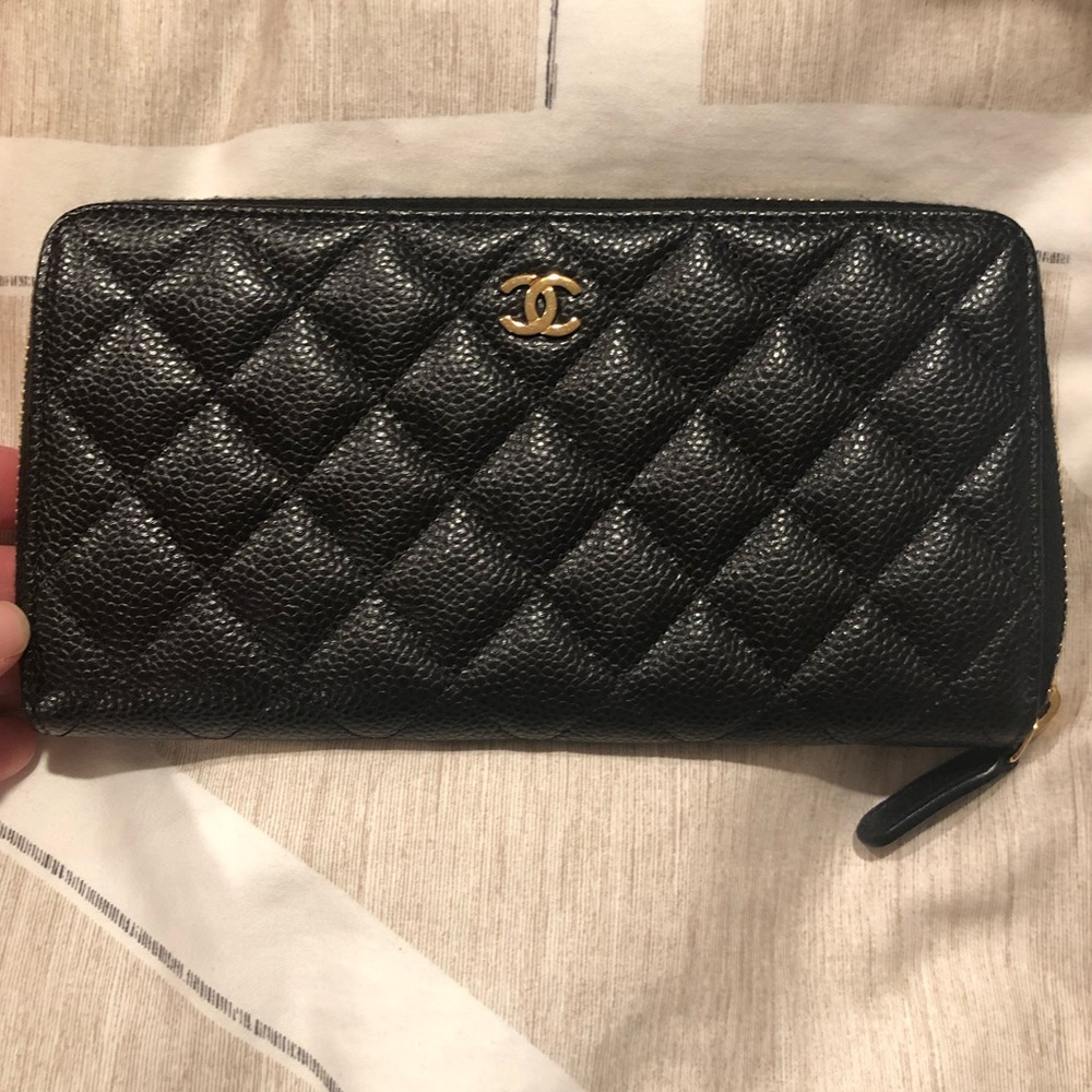 Chanel zip around wallet black quilted caviar